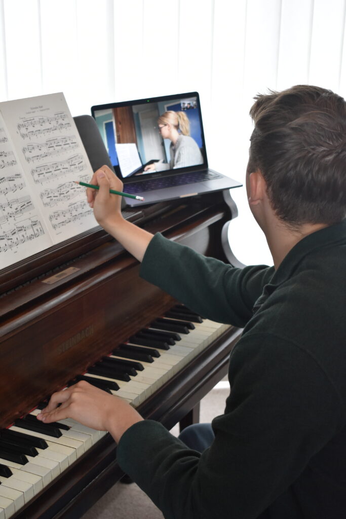 Billy teaching an online piano lesson 3